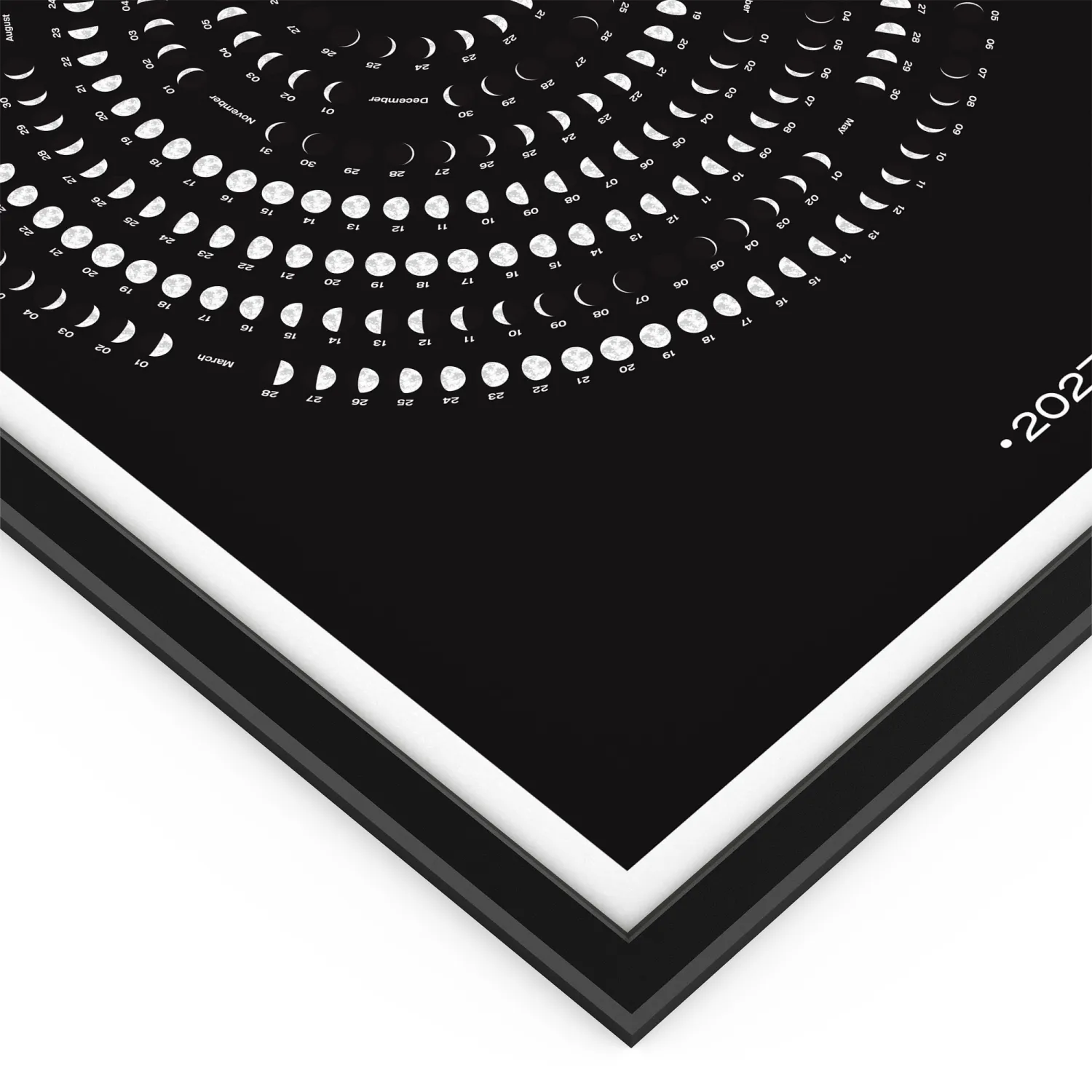 Close Up of 2027 Moon Calendar on Spiral Layout, Black Background, Lunar Phases Chart